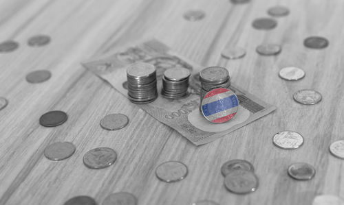 High angle view of coins on table