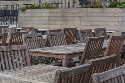 Tables and chairs at sidewalk cafe