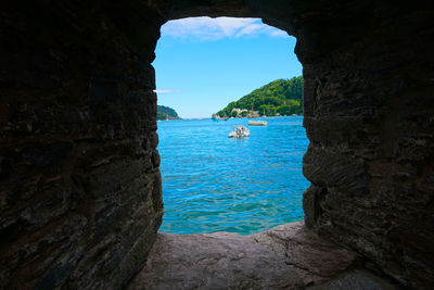 Scenic view of sea against blue sky