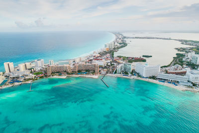 High angle view of swimming pool by sea against sky