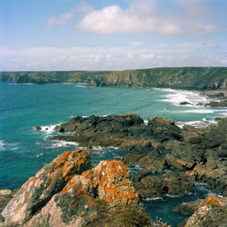 Scenic view of sea against sky at kynance cove