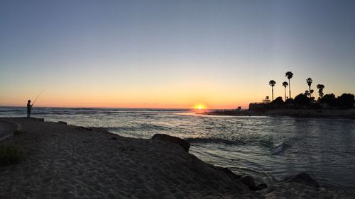 Scenic view of beach during sunset