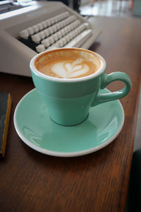 Close-up of coffee cup on table