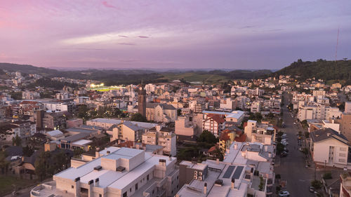 High angle view of townscape against sky during sunset