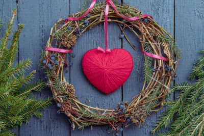 High angle view of decoration hanging on wood
