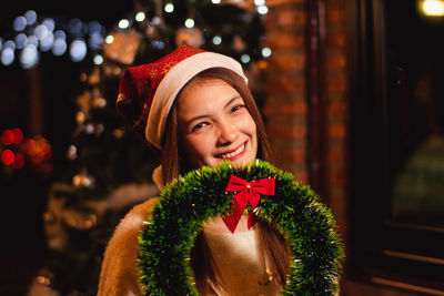 Portrait of smiling young woman