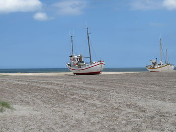 View of sailboat on beach 