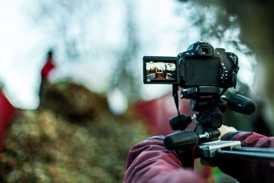 Man photographing camera