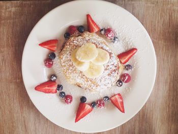 Directly above view of fresh fruit pancake served in plate