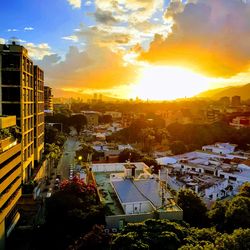 High angle view of townscape against sky at sunset