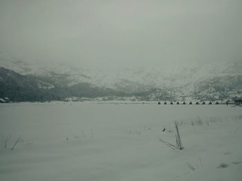 Scenic view of mountains against sky during winter