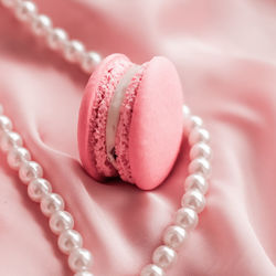 Close-up of wedding rings on table