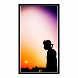 Silhouette man photographing against sky during sunset