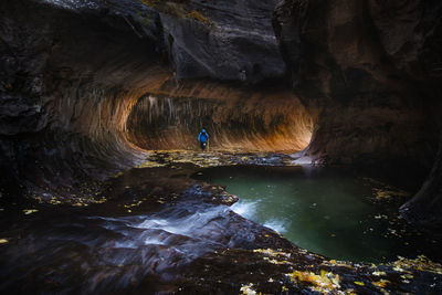 View of river flowing amidst canyon