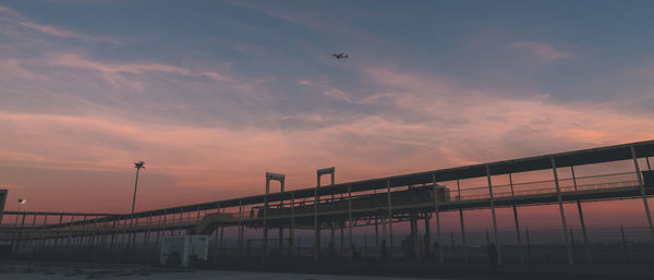 Panoramic view of bridge against sky during sunset