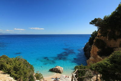 High angle view of sea against blue sky