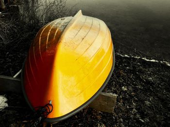 Close-up of yellow pumpkin on field