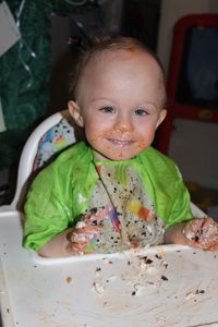 Portrait of cute boy eating food