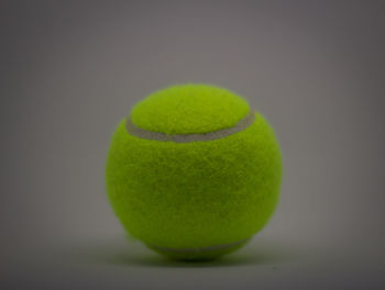 Close-up of green ball on table