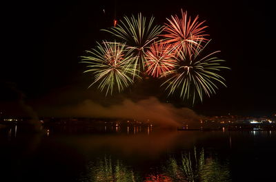 Firework display at night