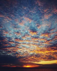 Scenic view of dramatic sky during sunset