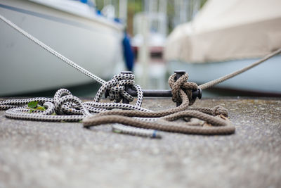 Close-up of rope tied to bollard