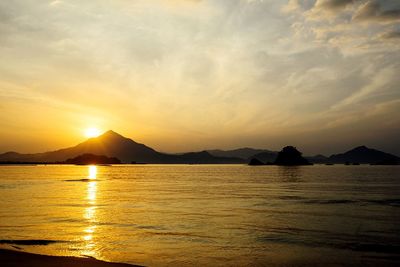 View of calm sea at sunset