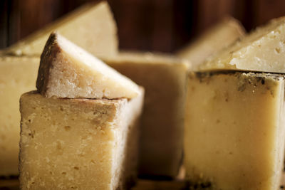 Close-up of bread on stack of table