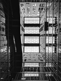 Low angle view of modern buildings in city at night