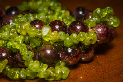 Close-up of grapes on table