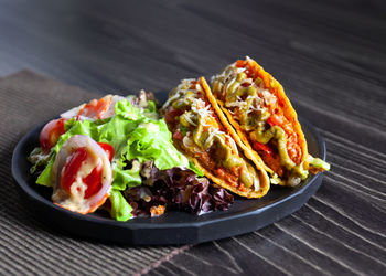 Meal served in plate on table