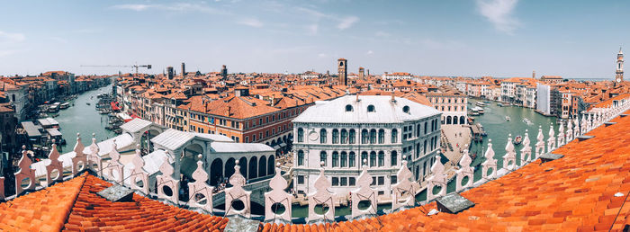 High angle view of buildings in city against sky