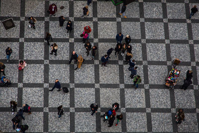 High angle view of people walking on city street