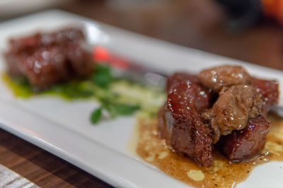 Close-up of served food in plate