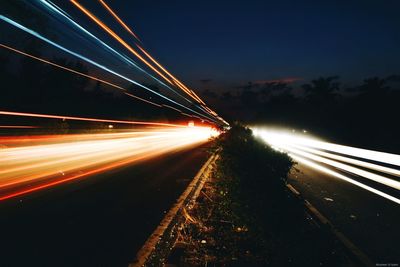 Light trails on road at night