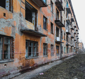 Low angle view of old buildings against sky