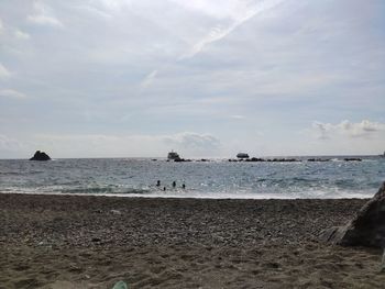 Scenic view of beach against sky