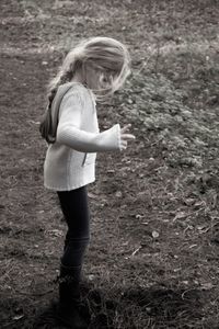 Girl standing on field