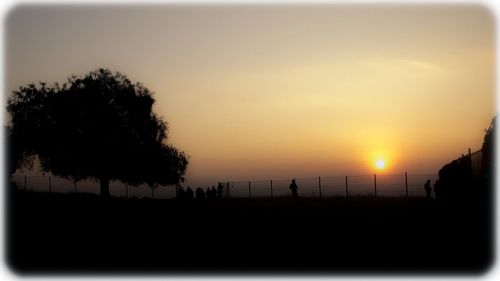 Scenic view of landscape at sunset