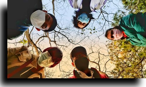 High angle view of people by plants