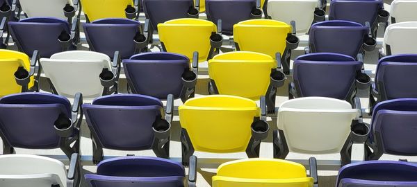 Full frame shot of multi colored stadium seating 