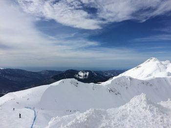 Scenic view of snow covered mountains