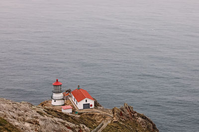 Point reyes lighthouse on cloudy day, pacific coast, california, usa