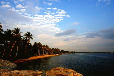 Scenic view of sea against cloudy sky