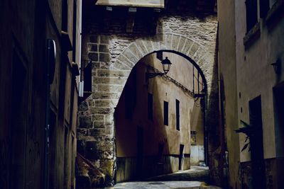 Narrow alley amidst old buildings