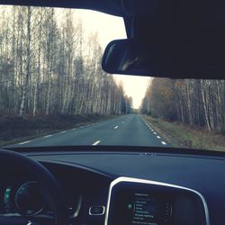 Road seen through car windshield