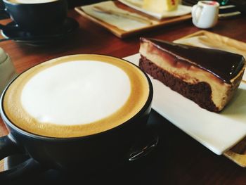 Close-up of coffee cup on table