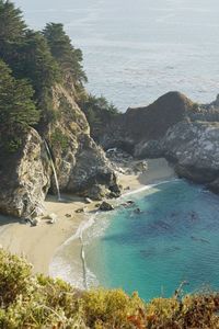 High angle view of mcway falls with blue ocean 