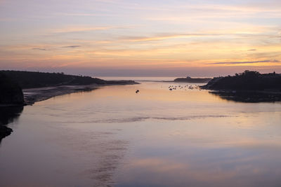 Scenic view of sea against sky during sunset