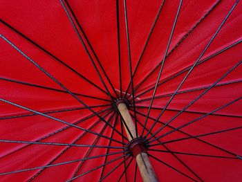 Low angle view of red umbrella